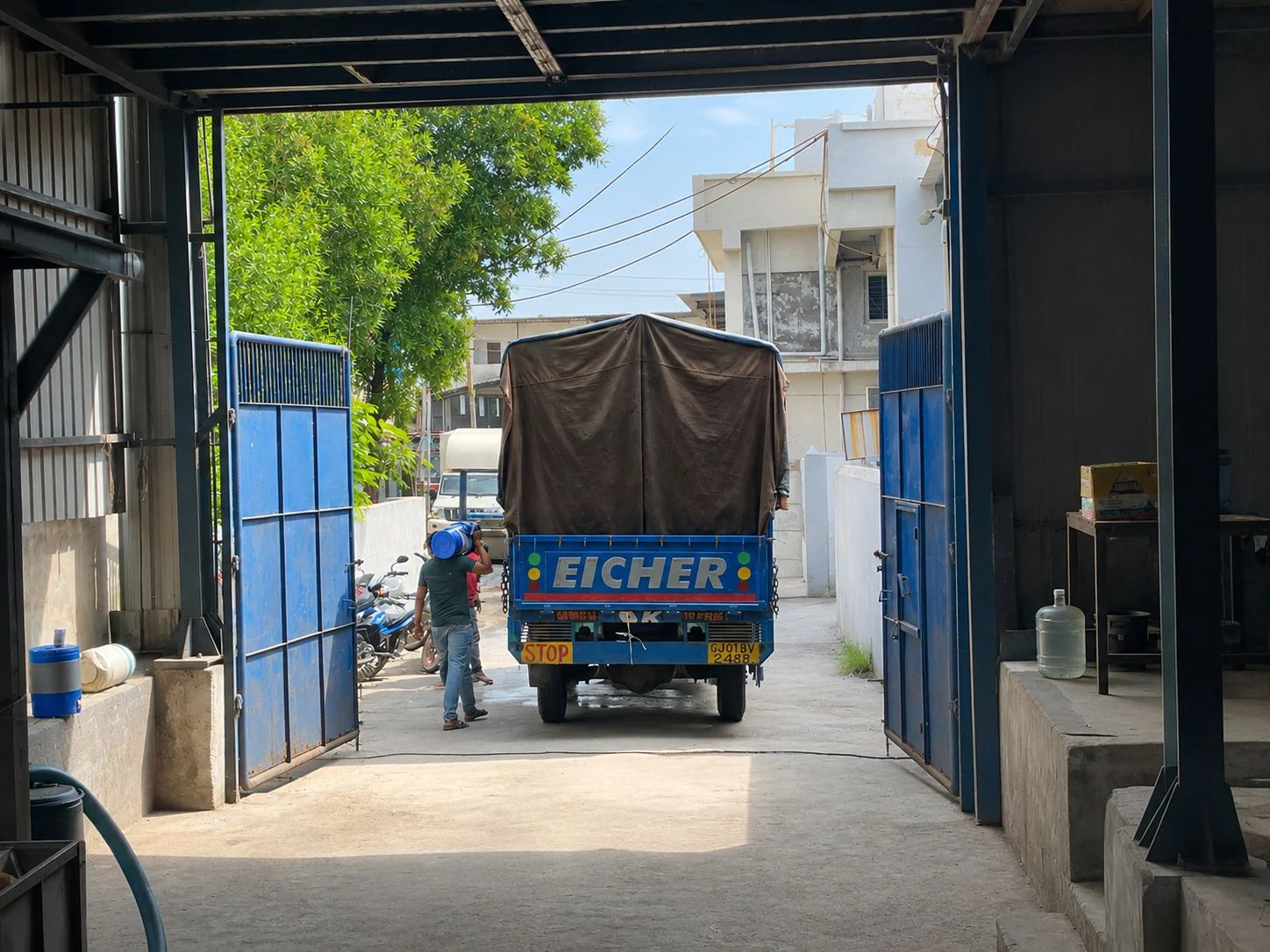 Eicher truck leaving the Goldtap Lubricant Specialities factory entrance in Changodar, Ahmedabad